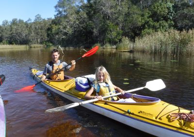 Family kayaking in the Noosa Everglades